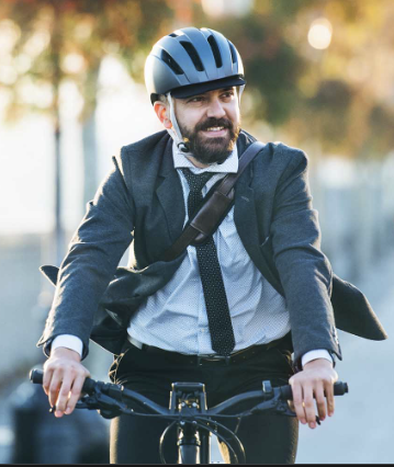 Lawyers drive on bicycle with smile